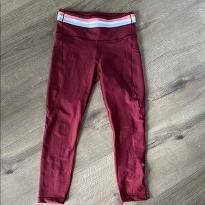Burgundy Athleta Interval Stash Leggings with Sporty Waistband